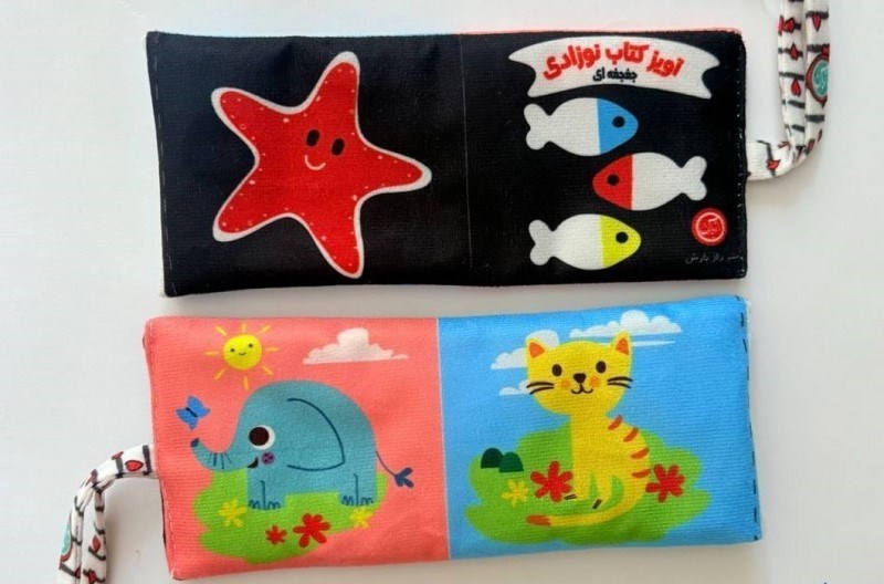 تصویر  آویز کتاب نوزادی جغجغه ای پارچه ای